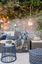 <p>String lights don't always have to steal the show. Draping them across some plants or a wall adds a lovely but subtle background touch to your outdoor gathering. Piling them into see-through bucket also makes for a pretty lantern.</p><p><strong>See more at <a href="https://stylebyemilyhenderson.com/blog/video/take-it-outside-target-patio-makeover" rel="nofollow noopener" target="_blank" data-ylk="slk:Style By Emily Henderson;elm:context_link;itc:0;sec:content-canvas" class="link ">Style By Emily Henderson</a>.</strong></p><p><strong><a class="link " href="https://www.amazon.com/Prextex-100-Count-Clear-Christmas-Decorations/dp/B075LQ4WTF/ref=sr_1_6?tag=syn-yahoo-20&ascsubtag=%5Bartid%7C10050.g.3404%5Bsrc%7Cyahoo-us" rel="nofollow noopener" target="_blank" data-ylk="slk:Shop Christmas Lights;elm:context_link;itc:0;sec:content-canvas">Shop Christmas Lights</a><br></strong></p>
