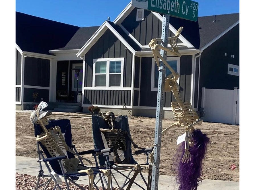 screenshot of post from Grantsville City facebook page showing pole-dancing skeleton