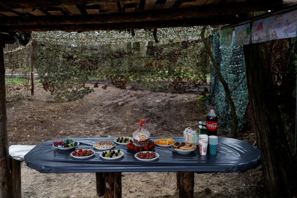 An Easter cake and eggs are seen at a table at a position of Ukrainian service members direction of the border with Belarus ahead of the Orthodox Easter (REUTERS)