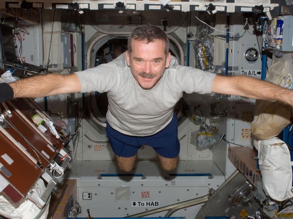 Canadian Space Agency astronaut Chris Hadfield, Expedition 34 flight engineer, floats freely in the Unity node of the International Space Station. Photo taken Dec. 31, 2012.