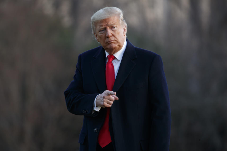 President Donald Trump points to the media as he arrives at the White House in Washington, Saturday, Feb. 29, 2020, on Marine One as he returns from speaking at the Conservative Political Action Conference (CPAC). (AP Photo/Carolyn Kaster)