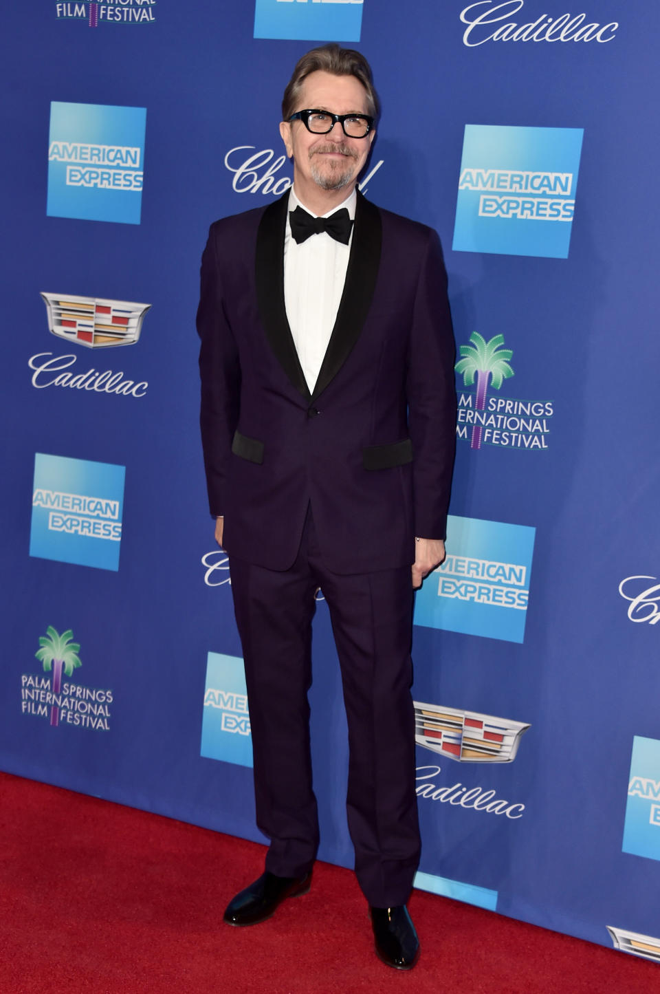 <p>The British actor jumped aboard the plum suit trend for the gala. <em>[Photo: Getty]</em> </p>