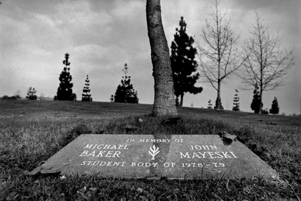 This is a memorial at Mira Mesa H.S. (near San Diego) that was placed on the school grounds by students. Also a tree (center) was planted in their honor. The two students, John Mayeski and Michael Baker, both 16, were murdered by Richard Alton Harris just a few miles from the school.