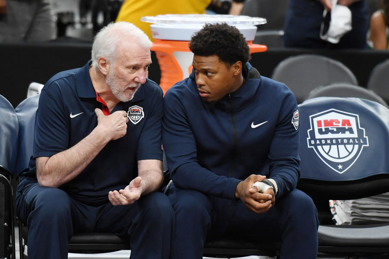 LAS VEGAS, NEVADA - AUGUST 09:  Head coach Gregg Popovich (L) of the 2019 USA Men's National Team talks with Kyle Lowry #51 of the 2019 USA Men's National Team before the 2019 USA Basketball Men's National Team Blue-White exhibition game at T-Mobile Arena on August 9, 2019 in Las Vegas, Nevada.  (Photo by Ethan Miller/Getty Images)
