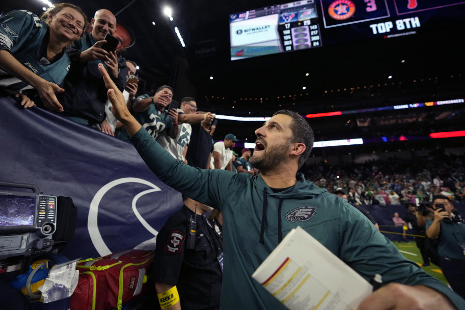 Philadelphia Eagles head coach Nick Sirianni greets fans as he walks off the field after an NFL football game against the Houston Texans in Houston, Thursday, Nov. 3, 2022. The Eagles won 29-17. (AP Photo/Eric Christian Smith)