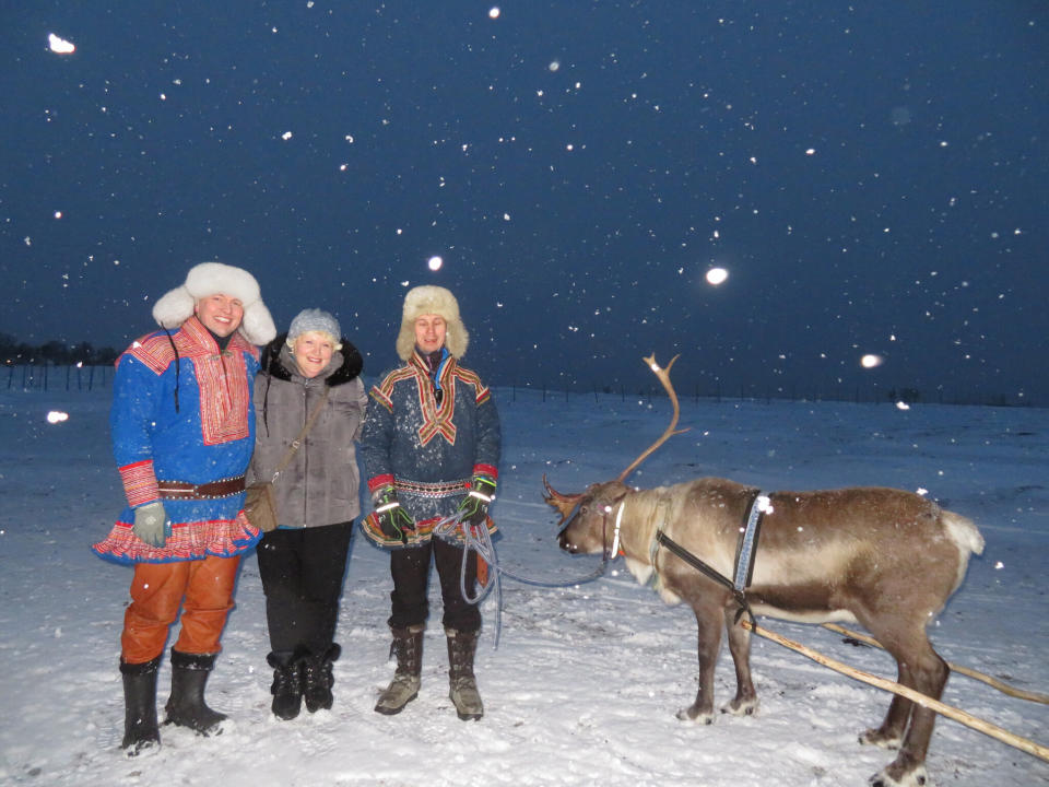 Amy Berman (second from left) recently visited Norway and even got a reindeer ride. She credits palliative care with her ability to keep working and traveling, despite a diagnosis of inflammatory breast cancer nine years ago. (Photo: Courtesy of Amy Berman)