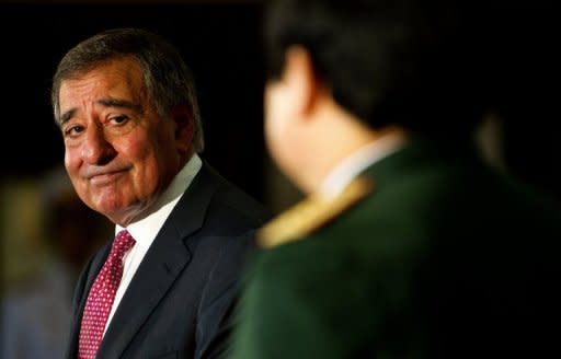 US Secretary of Defense Leon Panetta (L) speaks to Vietnam's Defence Minister Phung Quang Thanh (R) during a joint press conference at the Ministry of Defense in Hanoi. Panetta arrived in Hanoi on June 3 after visiting the former port at Cam Ranh Bay used by US forces during the Vietnam War