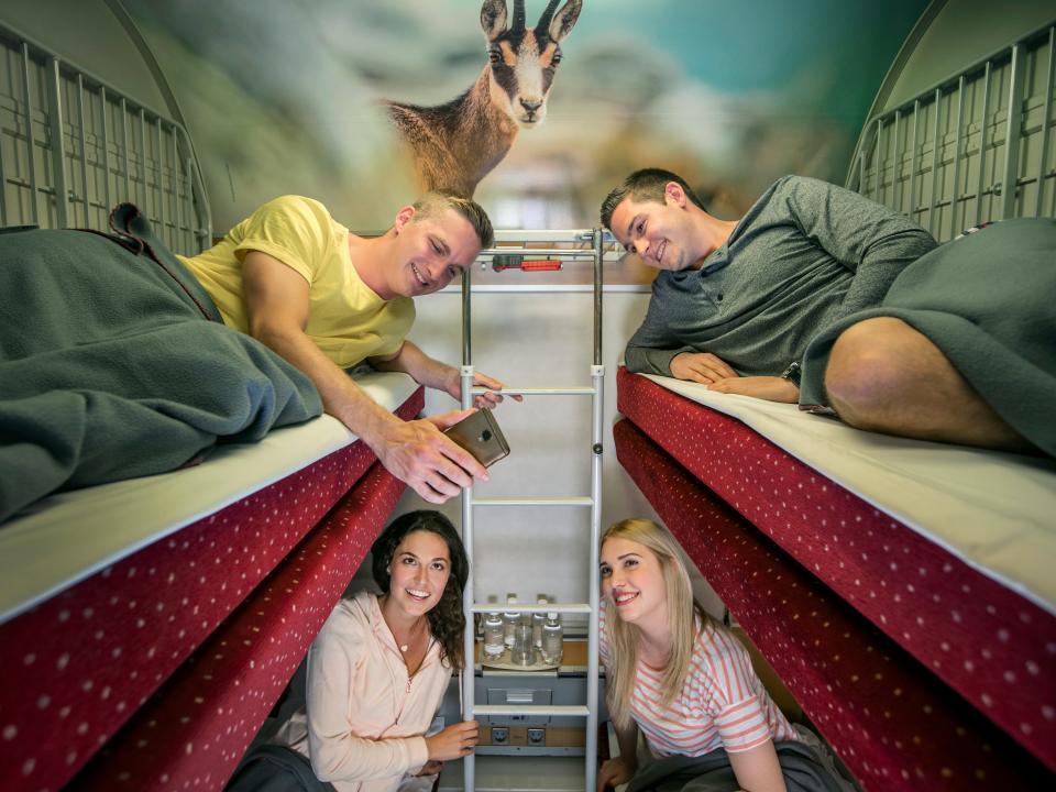 People share a bunk room on a Nightjet train.
