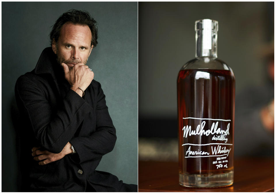 This combination photo shows actor Walton Goggins, left, and a bottle of Mulholland American Whiskey. Goggins, who appears in the FX series "Justified," and HBO's "Vice Principals" and "The Righteous Gemstones," partnered with founder Matthew Alper to produce a brand of whiskey, gin and vodka. (AP Photo, left, and Mulholland Distilling)