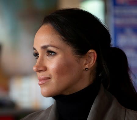 FILE PHOTO: Prince Harry, The Duke of Sussex with Meghan Markle the Duchess of Sussex meet young people from a number of mental health projects operating in New Zealand, at the Maranui Cafe in Wellington