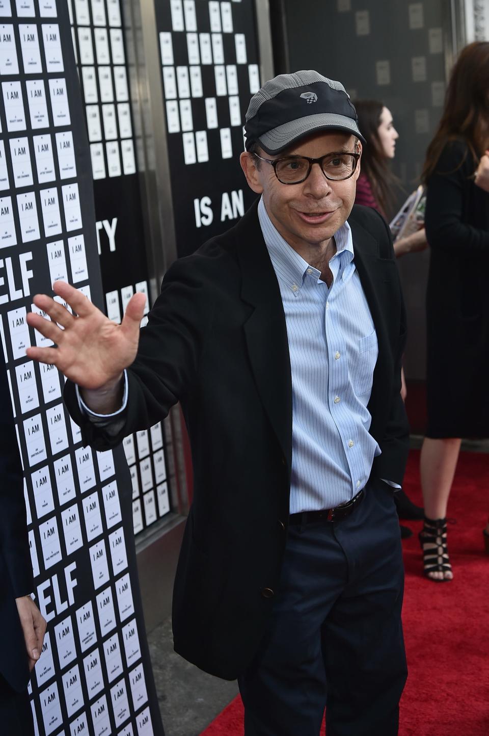 A suspect has been arrested for punching Rick Moranis, seen here on a red carpet in 2017.