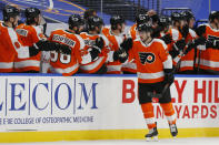 Philadelphia Flyers forward Scott Laughton (21) celebrates his goal during the second period of an NHL hockey game against the Buffalo Sabres, Saturday, Feb. 27, 2021, in Buffalo, N.Y. (AP Photo/Jeffrey T. Barnes)