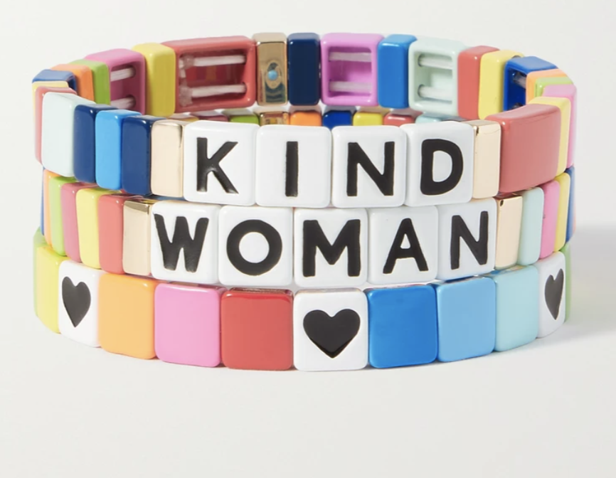 Set of three enamel and gold-tone bracelets, by Roxanne Assoulin, $468.43, in coloured tiles with hearts and letters, one saying 'kind', the other saying 'woman', another with hearts.