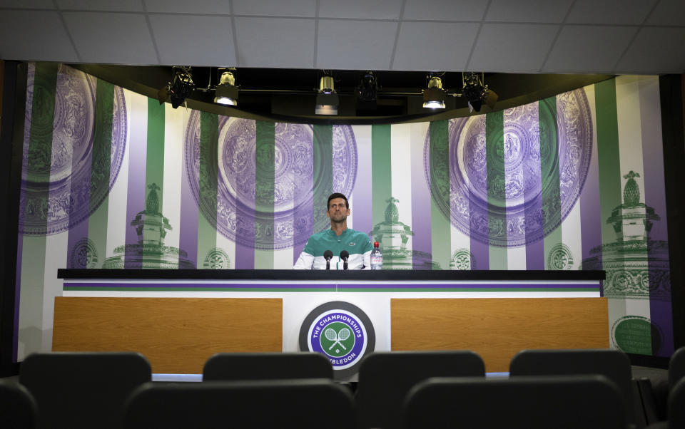 Novak Djokovic attends a socially distanced online media conference from the Main Interview Room ahead of The Championships 2021, Wimbledon, in London, Saturday June 26, 2021. (Florian Eisele/Pool via AP)