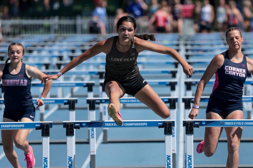 Athletes compete in a hurdles race at the Utah high school track and field championships at BYU in Provo on Thursday, May 18, 2023. | Spenser Heaps, Deseret News