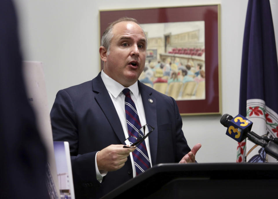 Colin Stolle, Virginia Beach Commonwealth Attorney, speaks during a press conference, Tuesday, Nov, 30, 2021, in Virginia Beach, Va., about the police involved shooting of Donovon Lynch last March. (Stephen Katz/The Virginian-Pilot via AP)
