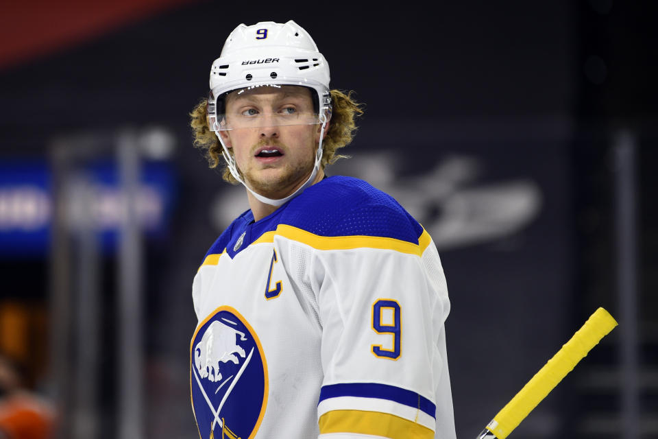 FILE- In this Jan. 19, 2021, file photo, Buffalo Sabres' Jack Eichel looks on during a stoppage in an NHL hockey game against the Philadelphia Flyers in Philadelphia. (AP Photo/Derik Hamilton, File)