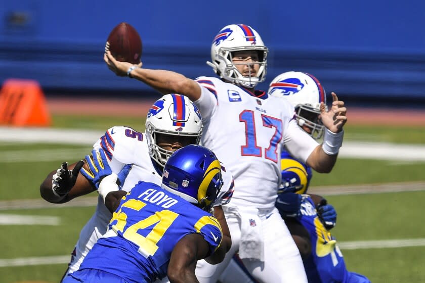 Buffalo Bills quarterback Josh Allen (17) throws a pass during the first half of an NFL football game.