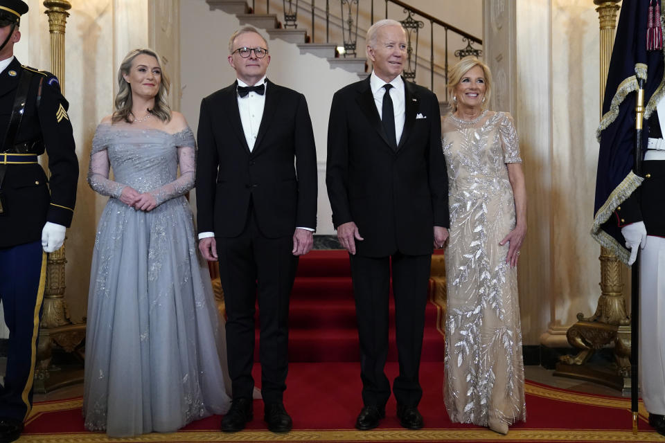 President Joe Biden, first lady Jill Biden and Australian Prime Minister Anthony Albanese and his partner Jodie Haydon pose for a photo at the Grand Staircase of the White House during the State Dinner Wednesday, Oct. 25, 2023, in Washington. (AP Photo/Evan Vucci)