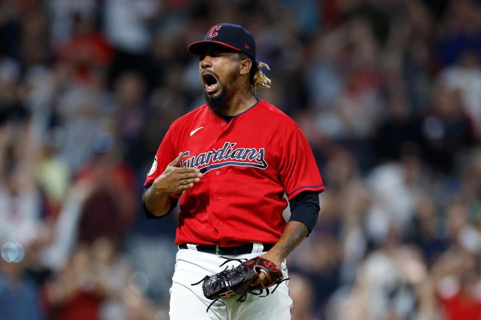Cleveland Guardians relief pitcher Emmanuel Clase celebrates an 8-4 win against the Detroit Tigers in a baseball game Wednesday, Aug. 17, 2022, in Cleveland. (AP Photo/Ron Schwane)