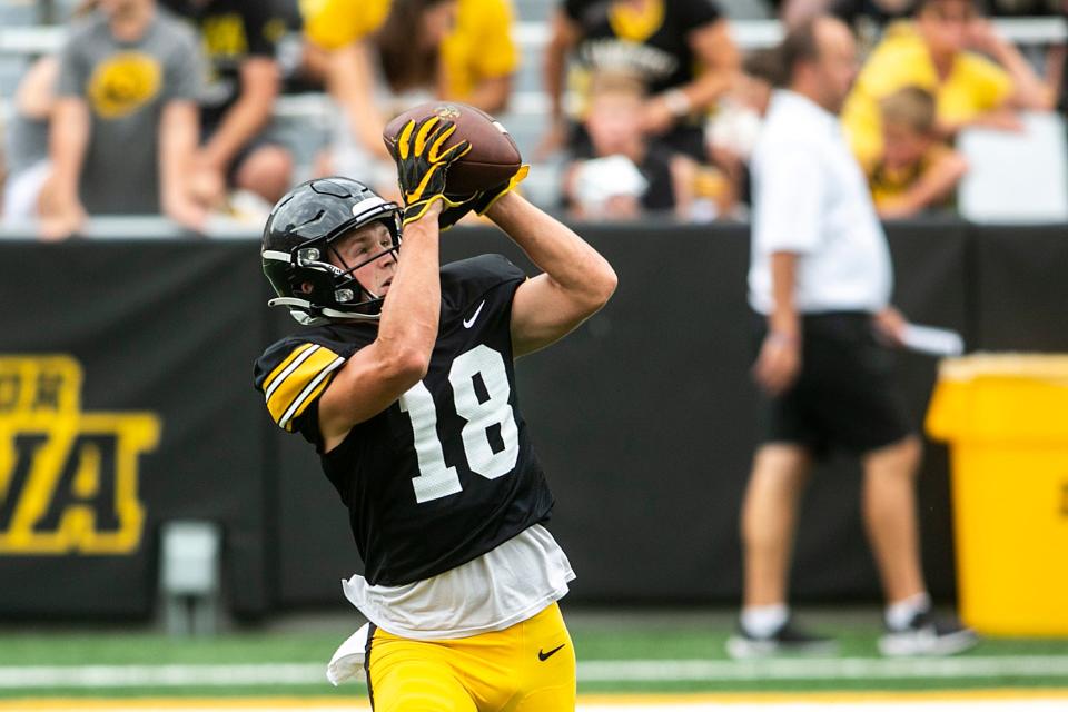 Iowa wide receiver Alec Wick runs a drill during the Kids Day at Kinnick event Aug. 13 at Kinnick Stadium.