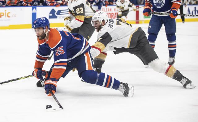 Vegas Golden Knights' Alex Pietrangelo (7) trips Edmonton Oilers' Darnell Nurse (25) during the second period of Game 4 of an NHL hockey second-round playoff series Wednesday, May 10, 2023, in Edmonton, Alberta. (Jason Franson/The Canadian Press via AP)