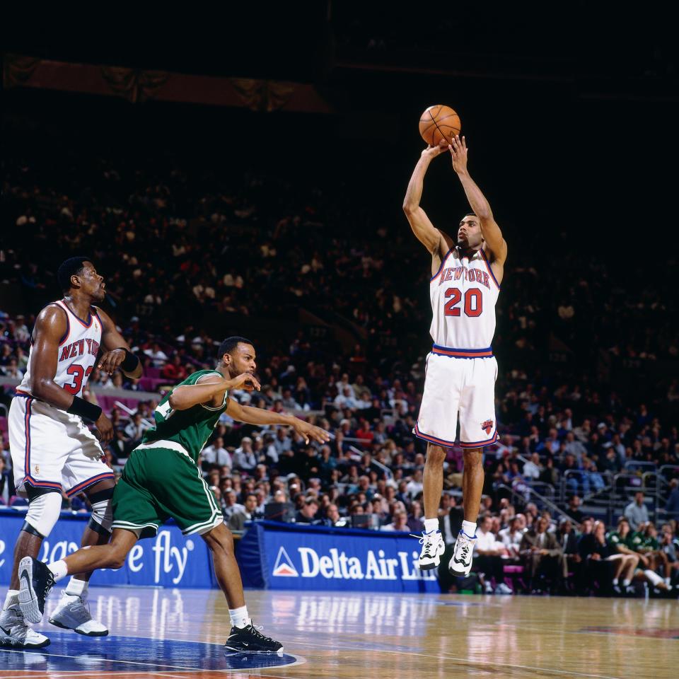 NEW YORK CITY - JANUARY 28: Allan Houston #20 of the New York Knicks shoots  during a game played on January 28, 1997 at Madison Square Garden in New York City. NOTE TO USER: User expressly acknowledges and agrees that, by downloading and/or using this photograph, user is consenting to the terms and conditions of the Getty Images License Agreement.  Mandatory Copyright Notice: Copyright 1997 NBAE (Photo by Nathaniel S. Butler/NBAE via Getty Images)