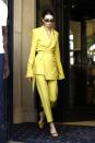 <p>The model wore a yellow House of Holland suit whilst out and about in Paris.</p>