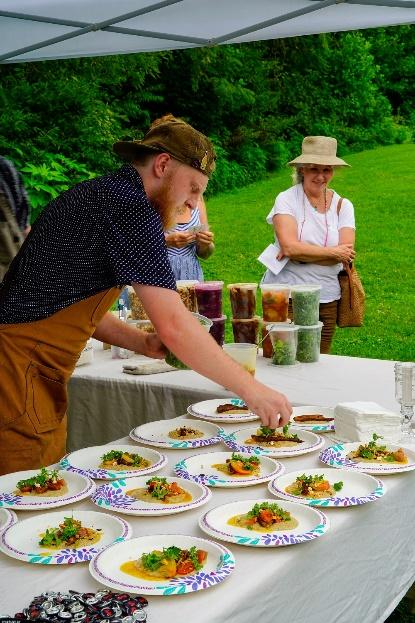 Chefs from Tastee Diner serve up samples created using fresh local produce during the 2022 Bountiful Cities’ Urban Garden Tour and Tasting.