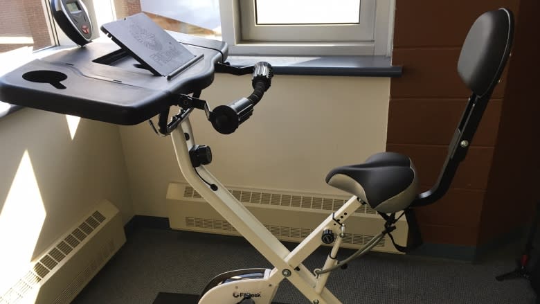 Double duty: Bicycle desk means students can cram workout into study session