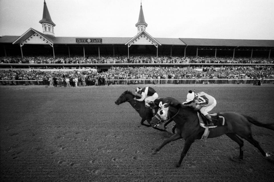 Foolish Pleasure, left, out duels Avatar in the home stretch to win the Kentucky Derby. 
May 1975