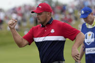 Team USA's Bryson DeChambeau reacts to his putt on the 11th hole during a Ryder Cup singles match at the Whistling Straits Golf Course Sunday, Sept. 26, 2021, in Sheboygan, Wis. (AP Photo/Jeff Roberson)