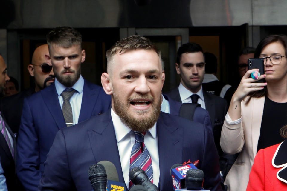 Mixed martial arts (MMA) fighter Conor McGregor speaks to the media as he exits the court after appearing in the Brooklyn court on charges of assault stemming from a melee, in the Brooklyn borough of New York City, U.S., July 26, 2018. REUTERS/Eduardo Munoz