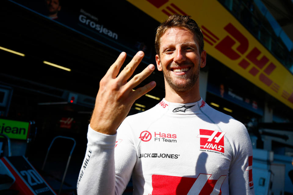 Four wheels on my wagon: Romain Grosjean celebrates fourth place (or celebrates having all four wheels still attached at race end)