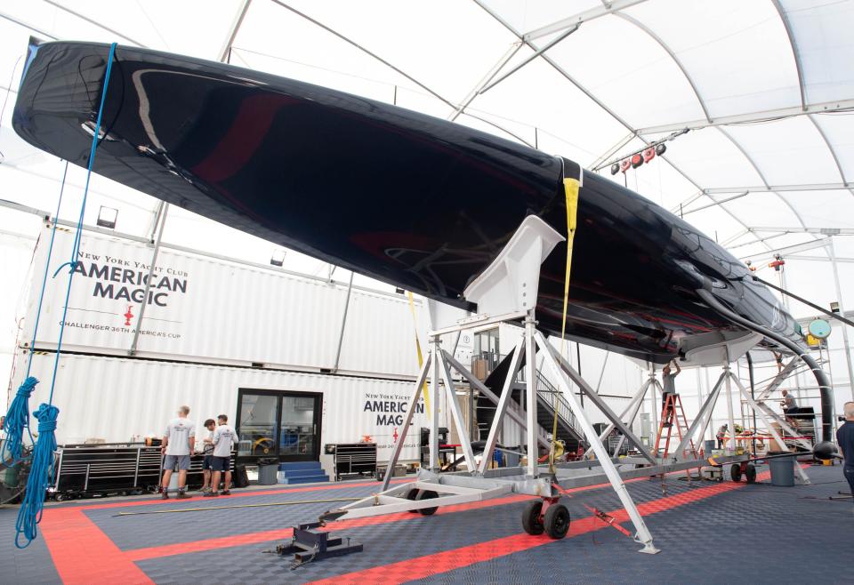 The American Magic team prepares for the America's Cup at their Port of Pensacola facilities on Friday.