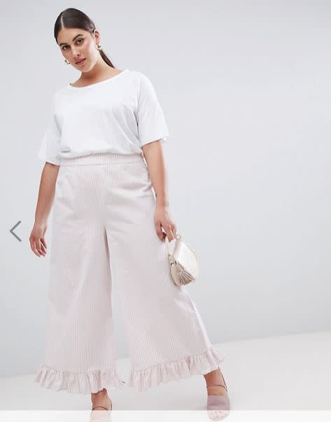 Get the matching set <a href="http://us.asos.com/lost-ink-plus/lost-ink-plus-wide-leg-pants-with-frill-hem-in-stripe-two-piece/prd/9712727?clr=pinkstripe&amp;SearchQuery=two%20piece%20set&amp;gridcolumn=4&amp;gridrow=6&amp;gridsize=4&amp;pge=1&amp;pgesize=72&amp;totalstyles=58" target="_blank">here</a>.