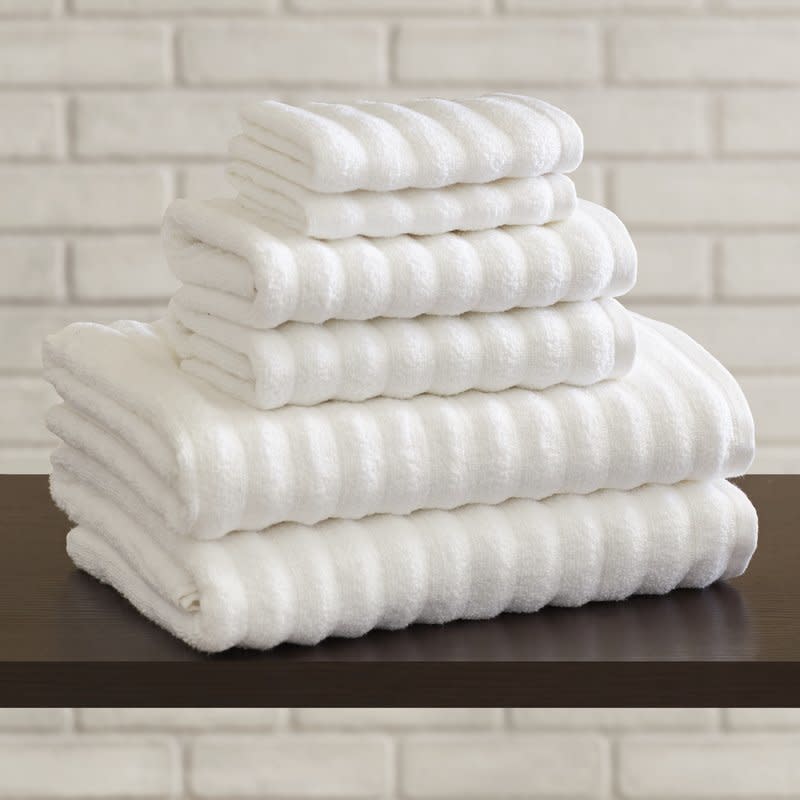 An easy way to refresh the bathroom is new towels. Get this six-piece set <a href="https://www.wayfair.com/Brayden-Studio-Bishopsworth-6-Piece-Towel-Set-BRSD3606.html?piid=15418550" target="_blank">here</a>, $42.