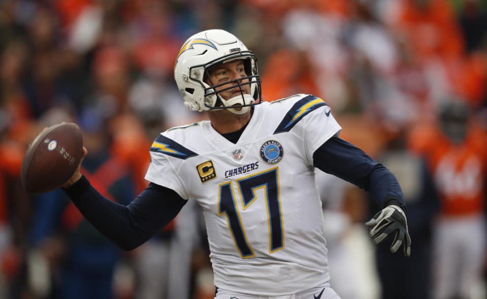 Los Angeles Chargers quarterback Philip Rivers throws a pass during the first half of an NFL football game against the Denver Broncos, Sunday, Dec. 30, 2018, in Denver. (AP Photo/David Zalubowski)