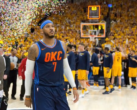 Apr 27, 2018; Salt Lake City, UT, USA; Oklahoma City Thunder forward Carmelo Anthony (7) walks off the court after losing game six of the first round of the 2018 NBA Playoffs against against the Utah Jazz at Vivint Smart Home Arena. Mandatory Credit: Russ Isabella-USA TODAY Sports