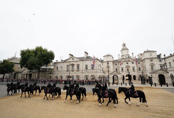 LONDON, ENGLAND - SEPTEMBER 19: Mounted police pass through Whitehall ahead of the State Funeral of Queen Elizabeth II at Westminster Abbey on September 19, 2022 in London, England.  Elizabeth Alexandra Mary Windsor was born in Bruton Street, Mayfair, London on 21 April 1926. She married Prince Philip in 1947 and ascended the throne of the United Kingdom and Commonwealth on 6 February 1952 after the death of her Father, King George VI. Queen Elizabeth II died at Balmoral Castle in Scotland on September 8, 2022, and is succeeded by her eldest son, King Charles III. (Photo by David Davies - WPA Pool/Getty Images)