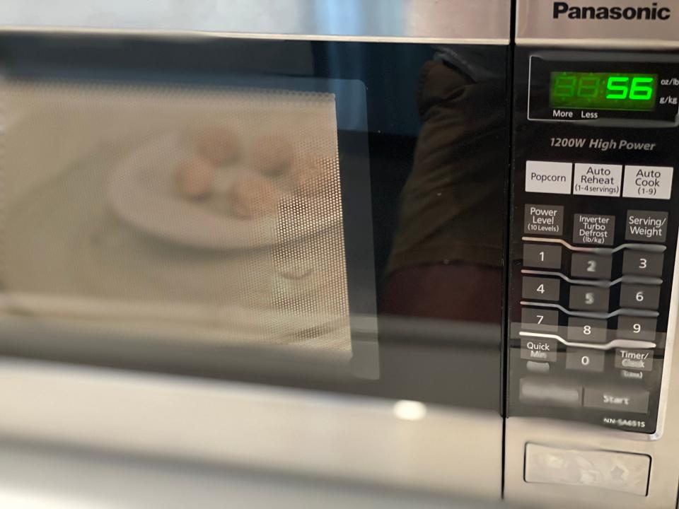 plate of meatballs in a microwave