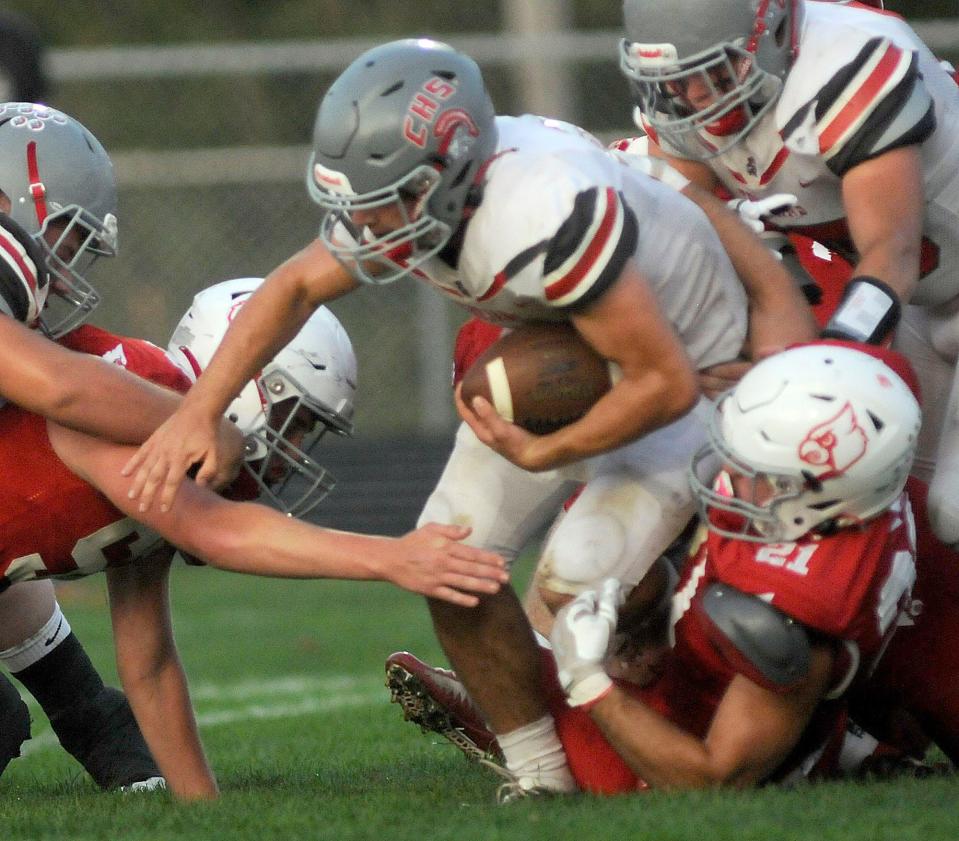 Loudonville High School's Micah Simpson (21) tackles centerburg's Tyler Johnson during football action between Centerburg and Loudonville at Redbird Stadium  Friday September 16,2022  Steve Stokes/for Ashland Times-Gazette