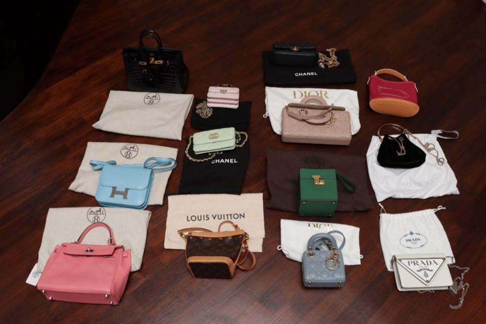 An undated handout photo released by the Singapore Police Force shows luxury handbags seized during an anti-money laundering raid in Singapore (EPA)