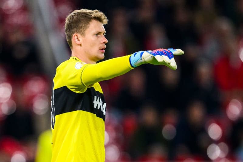 Stuttgart's goalkeeper Alexander Nuebel gestures during the German DFB cup game between VfB Stuttgart and 1. FC Union Berlin at MHPArena. Nuebel remains sidelined with hip problems as it remains unclear whether he can return between the posts in Saturday's Bundesliga match against Cologne. Tom Weller/dpa