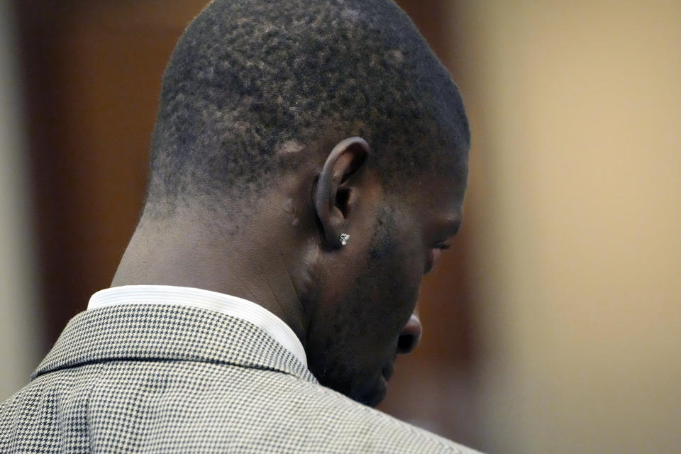 Michael Corey Jenkins, bearing the scaring from being shot in the mouth by a former Mississippi law enforcement officer, appears in a Rankin County Courtroom to read his victims impact statement, as the men are sentenced in state court, Wednesday, April 10, 2024, in Brandon, Miss. Rankin County Circuit Judge Steve Ratcliff on Wednesday gave the six white former Mississippi law enforcement officers yearslong state sentences that were shorter than the amount of time in federal prison they had already received, but longer than what state prosecutors had recommended. (AP Photo/Rogelio V. Solis)