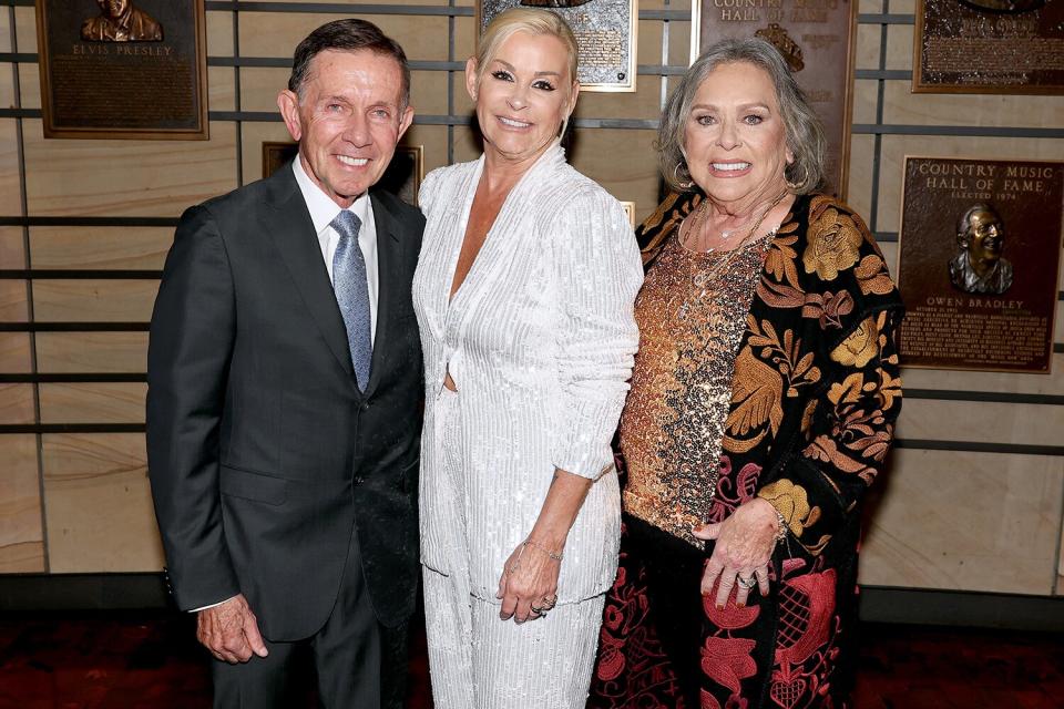 Country Music Hall of Fame inductee Joe Galante, Lorrie Morgan and Judith Lewis attend the class of 2022 Medallion Ceremony at Country Music Hall of Fame and Museum on October 16, 2022 in Nashville, Tennessee.