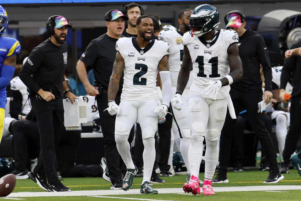 Philadelphia Eagles wide receiver A.J. Brown, right, celebrates a catch with cornerback Darius Slay, center, and head coach Nick Sirianni, left, during the second half of an NFL football game against the Los Angeles Rams Sunday, Oct. 8, 2023, in Inglewood, Calif. (AP Photo/Kevork Djansezian)