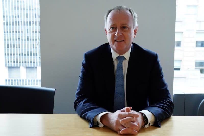 FILE PHOTO: CEO of Lloyd's of London John Neal poses for a photo in the Manhattan borough of New York City