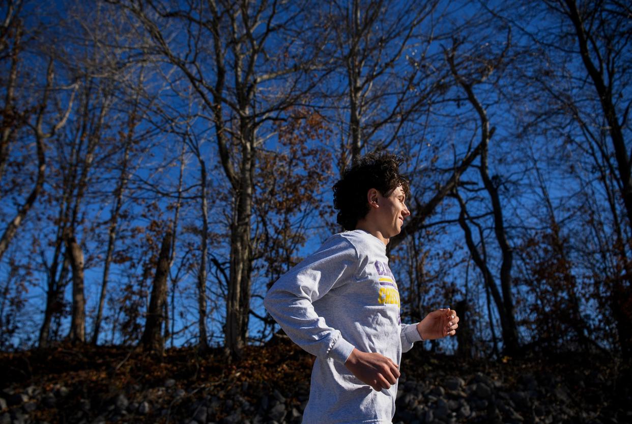 Clarksville cross country runner, Hayden Waleski, runs for a portrait at Clarksville High School in Clarksville , Tenn., Friday, Dec. 15, 2023.