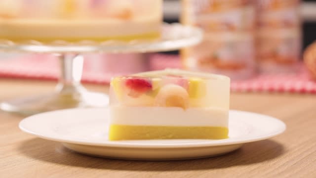 A slice of Almond Tofu with Mixed Fruit Agar Agar